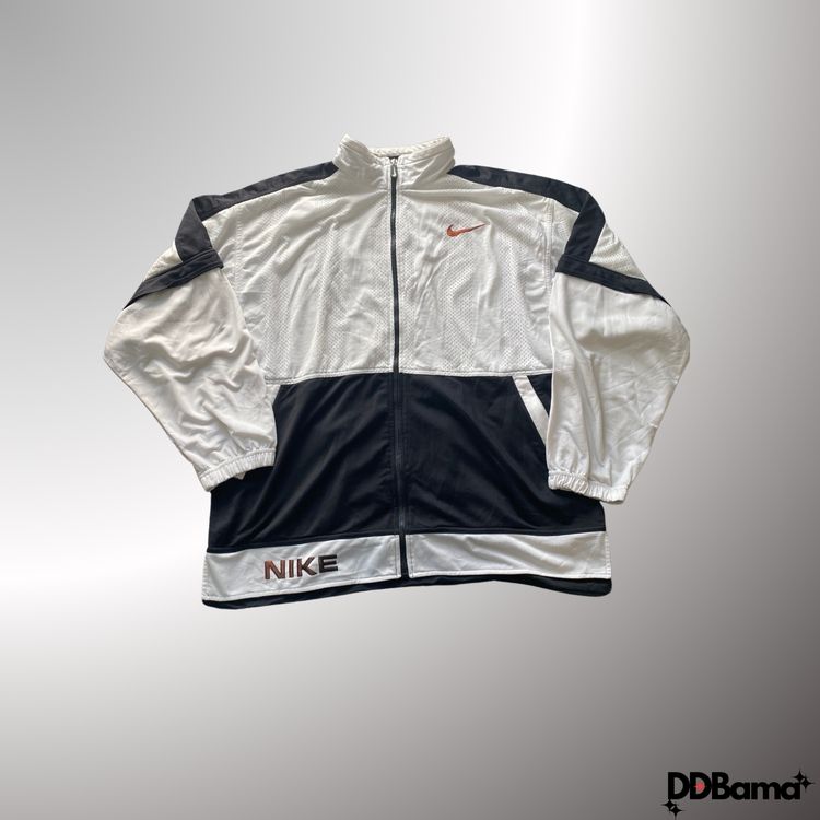 Vintage Nike track jacket featuring a stylish white and black color block design